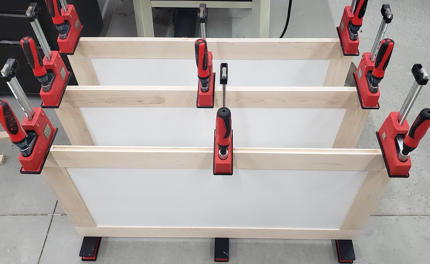 Clamping shaker style panles made from MDF and maple with Bessey Revo parallel clamps