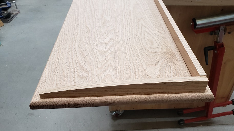 Mock up of curved guards on unfinished oak top