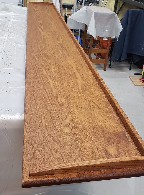 Oak bookshelf top stained with Cabot golden oak stain