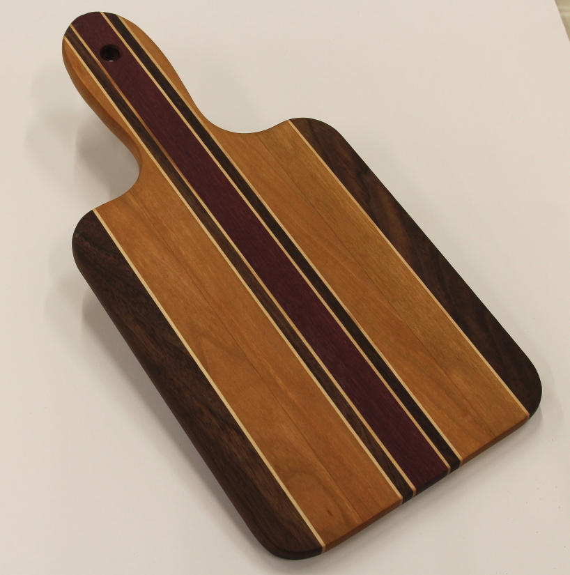 Cherry walnut purpleheart and maple striped charcuterie board with handle