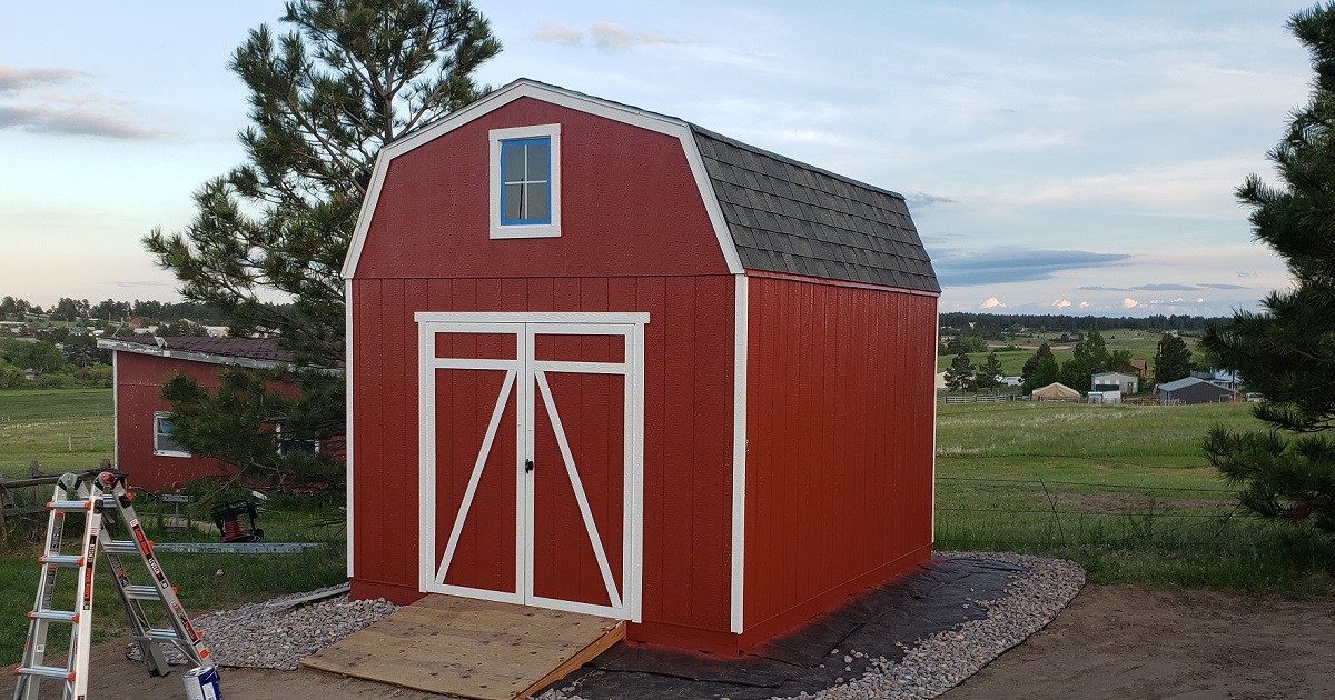 Red and white Heartland Gambrel storage shed