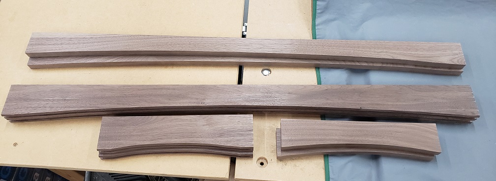 Long and short walnut board with arches to be used as stiles