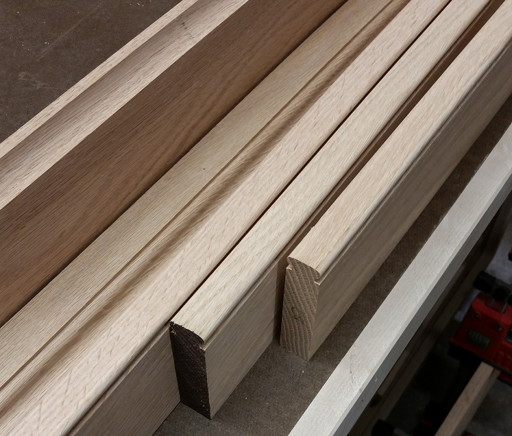 Oak board with cove, ogee, and beating routed profiles