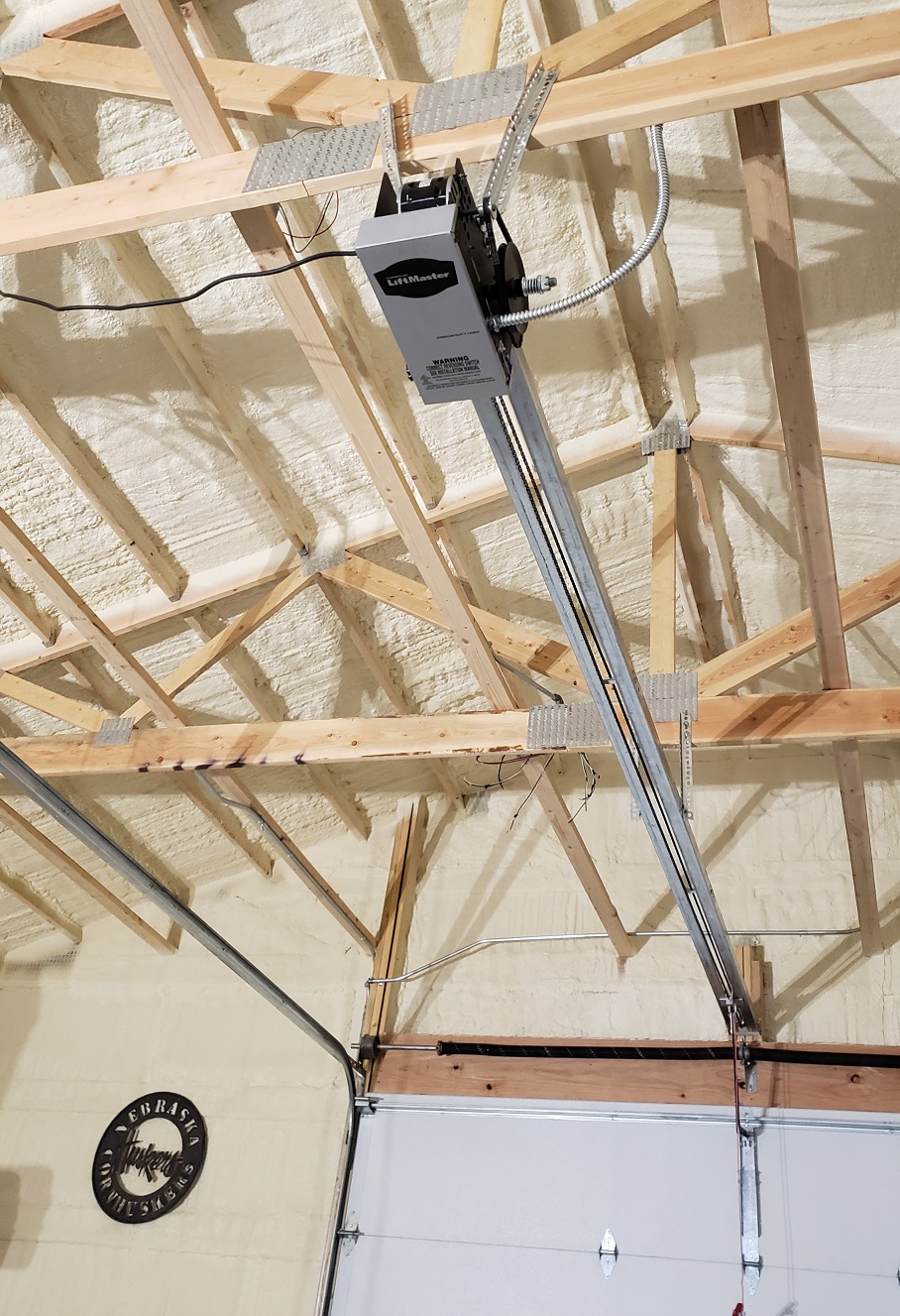 Liftmaster MT trolley commercial garage door opener in pole barn