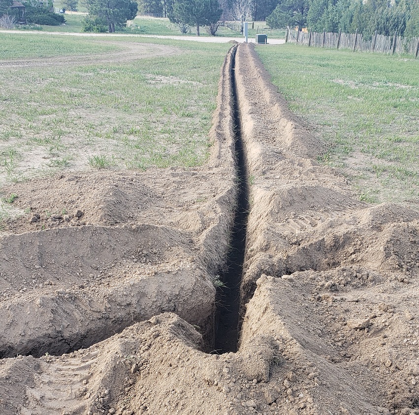 Trench dug for electrical service line