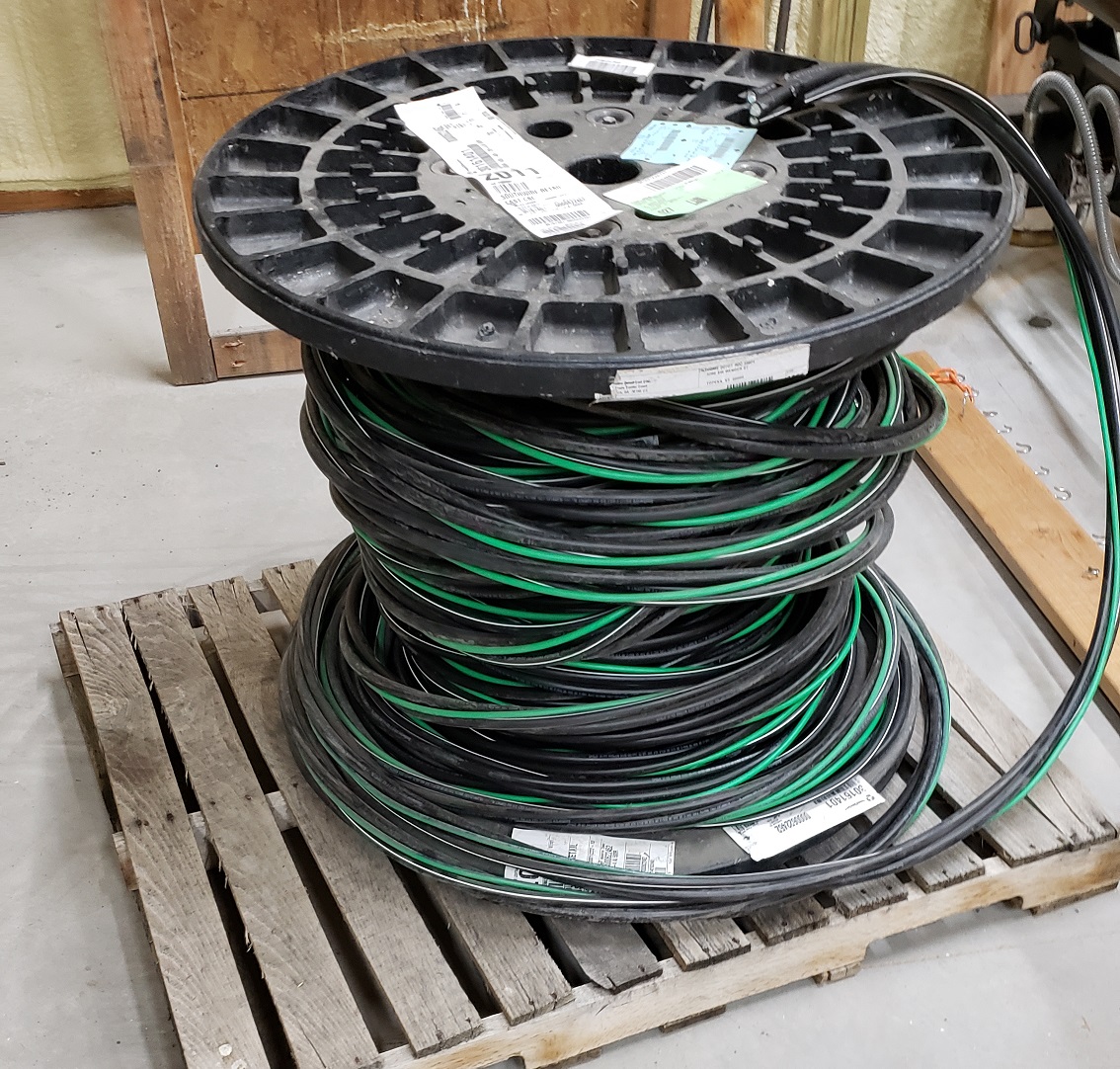 Spool of three conductor 4/0 aluminum service wire with ground