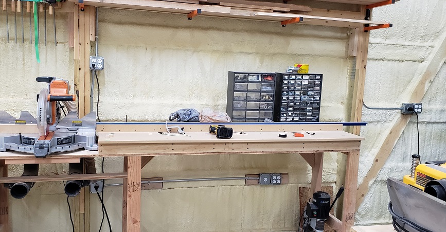 Ridgid compund miter saw on bench with Kreg measuring system