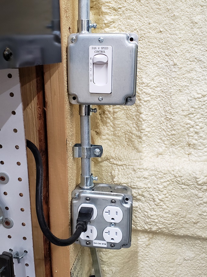 Outlets and fan speed controller installed in EMT boxes