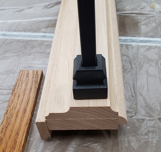 Custom oak foot rail for metal ballusters
