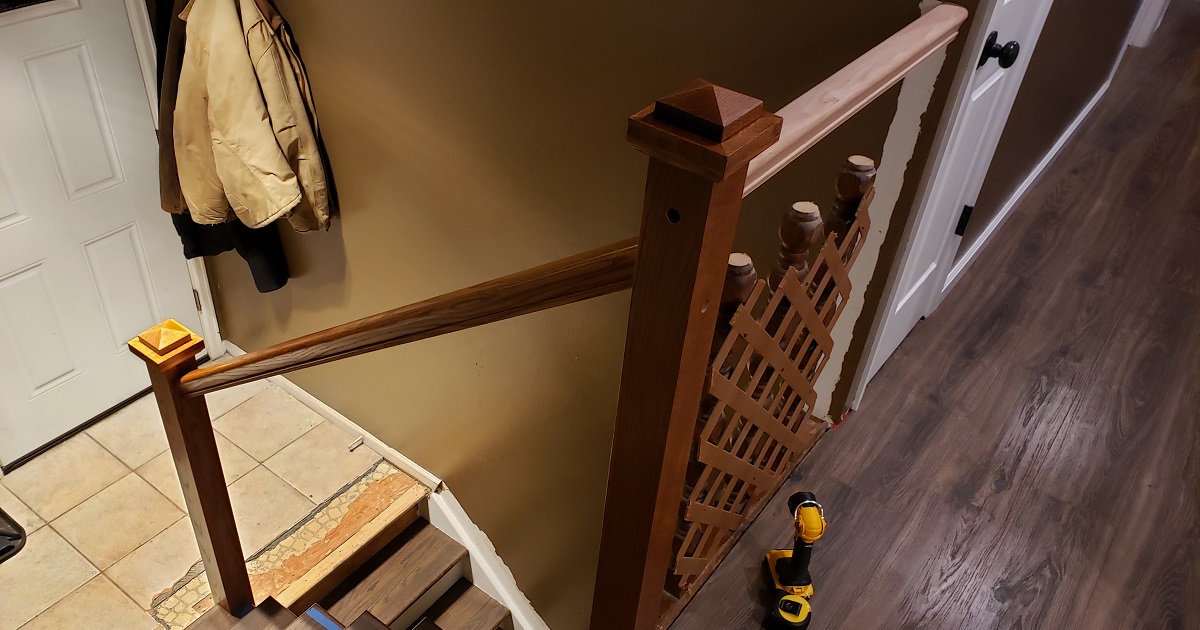 Craftsman stair railing construction dark oak treads brown wall