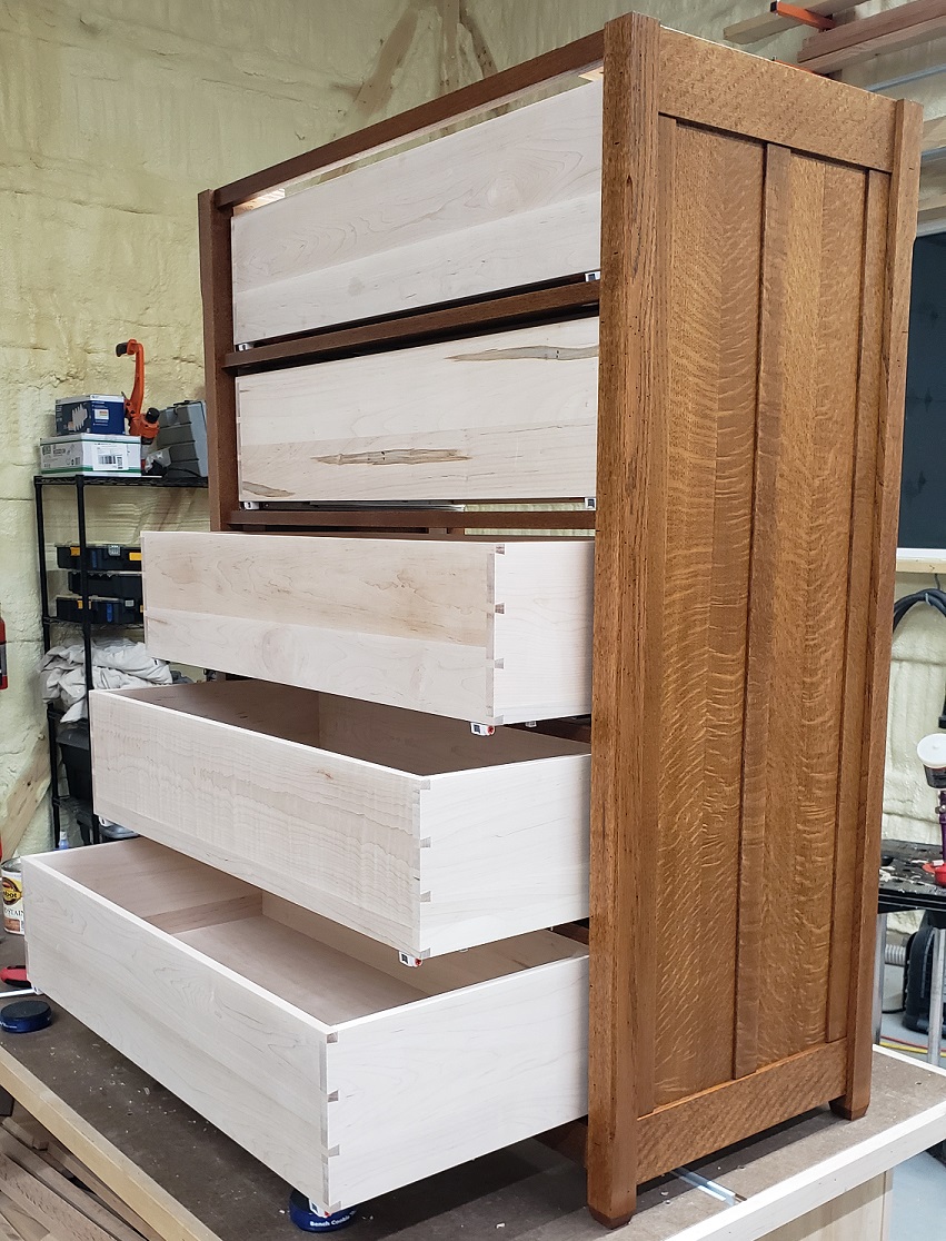 Oak mission style dresser with maple drawer boxes on workbench