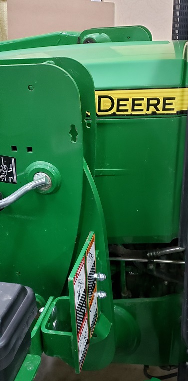 Carriage bolt holes on a John Deere H240 loader