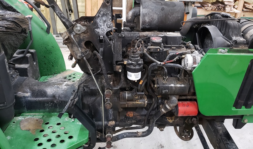 Engine and operator console fire damage on a John Deere 5105 tractor