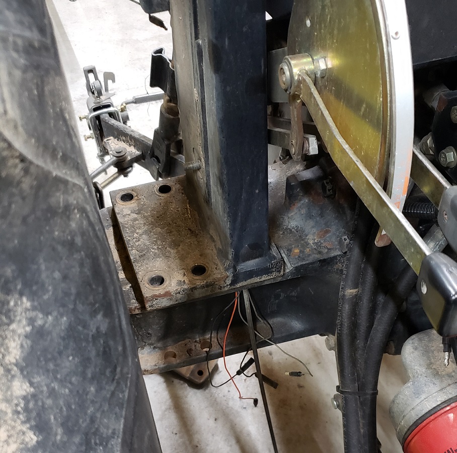 Fishing wires through ROPS on John Deere 5105 tractor