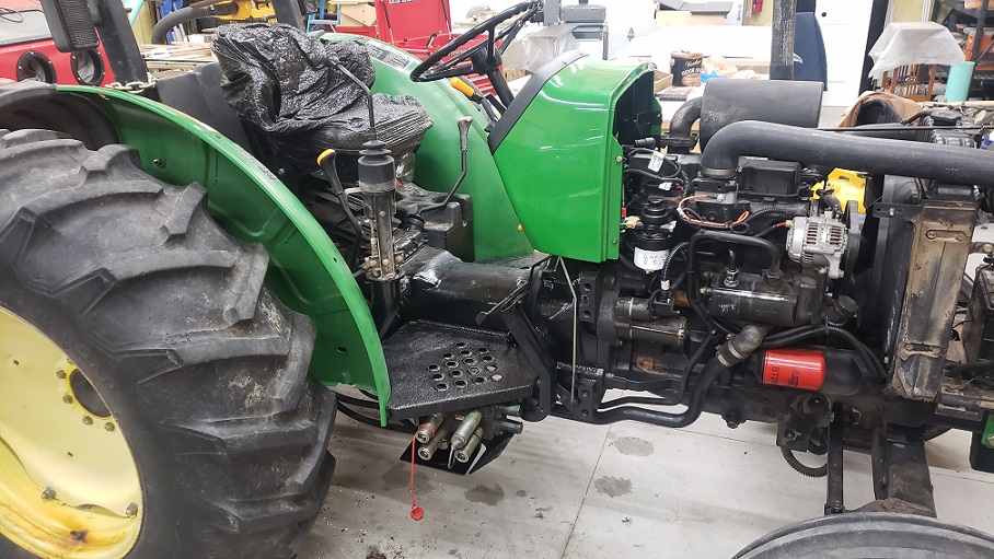 Herculiner painted onto operator platofrm on John Deere 5105 tractor