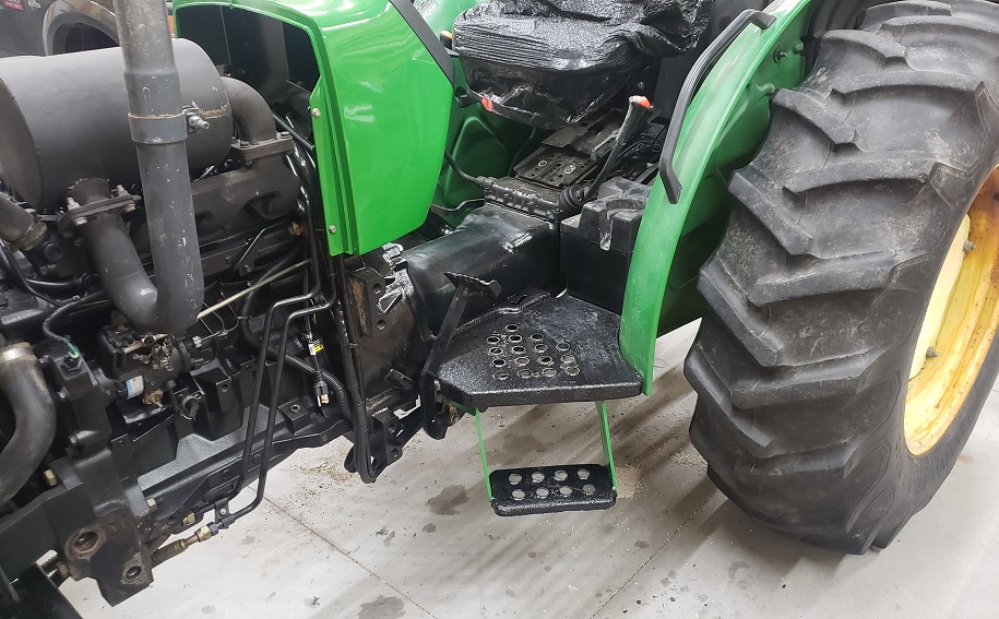 Herculiner painted onto operator platofrm on John Deere 5105 tractor